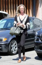 REBECCA ROMIJN Leaves a Hair Salon in Los Angeles 03/30/2017