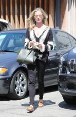 REBECCA ROMIJN Leaves a Hair Salon in Los Angeles 03/30/2017