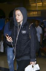 RILEY KEOUGH at LAX Airport in Los Angeles 03/08/2017