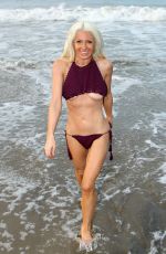 SARA BARRETT in Bikini at a Beach in Malibu 03/22/2017