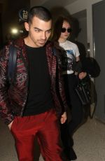 SOPHIE TURNER and Joe Jonas at LAX Airport in Los Angeles 03/05/2017