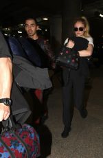 SOPHIE TURNER and Joe Jonas at LAX Airport in Los Angeles 03/05/2017