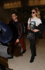 SOPHIE TURNER and Joe Jonas at LAX Airport in Los Angeles 03/05/2017