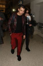 SOPHIE TURNER and Joe Jonas at LAX Airport in Los Angeles 03/05/2017
