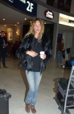STELLA MAXWELL at Charles De Gaulle Airport in Paris 03/03/2017