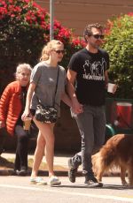 AMANDA SEYFRIED and Thomas Sadoski Walk Their Dog Out in Los Angeles 04/14/2017