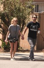 AMANDA SEYFRIED and Thomas Sadoski Walk Their Dog Out in Los Angeles 04/14/2017