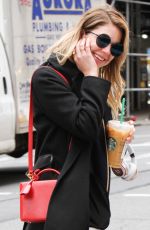 ASHLEY BENSON Leaves Starbucks in New York 04/19/2017