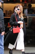 ASHLEY BENSON Leaves Starbucks in New York 04/19/2017