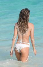 BROOKE BURKE in Swimsuit at a Beach in St. Barths 04/04/2017