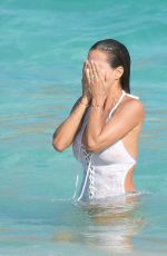 BROOKE BURKE in Swimsuit at a Beach in St. Barths 04/04/2017