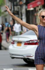 CANDICE SWANEPOEL Hails a Cab in New York 04/28/2017