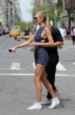 CANDICE SWANEPOEL Hails a Cab in New York 04/28/2017