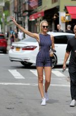 CANDICE SWANEPOEL Hails a Cab in New York 04/28/2017