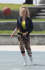 CHARLOTTE MCKINNEY on the Set of a Photoshoot in Venice Beach 04/04/2017