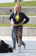 CHARLOTTE MCKINNEY on the Set of a Photoshoot in Venice Beach 04/04/2017