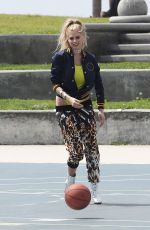 CHARLOTTE MCKINNEY on the Set of a Photoshoot in Venice Beach 04/04/2017