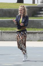 CHARLOTTE MCKINNEY on the Set of a Photoshoot in Venice Beach 04/04/2017