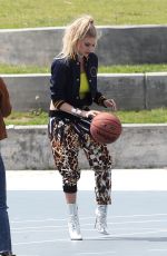 CHARLOTTE MCKINNEY on the Set of a Photoshoot in Venice Beach 04/04/2017