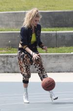 CHARLOTTE MCKINNEY on the Set of a Photoshoot in Venice Beach 04/04/2017