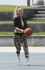 CHARLOTTE MCKINNEY on the Set of a Photoshoot in Venice Beach 04/04/2017