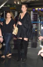 CHRISSY TEIGEN at JFK Airport in Los Angeles 04/12/2017