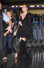 CHRISSY TEIGEN at JFK Airport in Los Angeles 04/12/2017