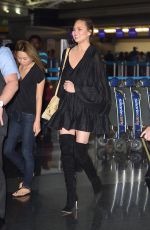 CHRISSY TEIGEN at JFK Airport in Los Angeles 04/12/2017