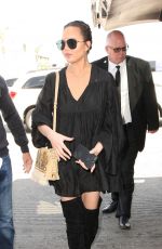 CHRISSY TEIGEN at LAX Airport in Los Angeles 04/12/2017