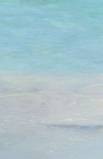 CINDY CRAWFORD in Bikini at a Beach in St Barth 04/07/2017