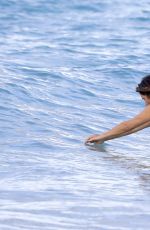 CINDY CRAWFRD in Bikini Swimming in the Sea in St. Barts 04/08/2017