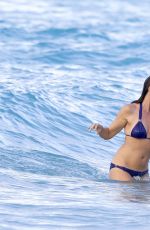 CINDY CRAWFRD in Bikini Swimming in the Sea in St. Barts 04/08/2017