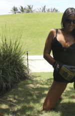 CLAUDIA ROMANI on the Set of a Photoshoot with Boxing Gloves in Miami 04/02/2017
