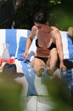COURTENEY COX in Bikini at a Pool in Miami 03/31/2017