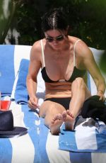 COURTENEY COX in Bikini at a Pool in Miami 03/31/2017