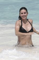 COURTENEY COX in Bikini on the Beach in Bahamas 04/02/2017