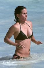 COURTENEY COX in Bikini on the Beach in Bahamas 04/04/2017