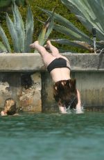 DAKOTA JOHNSON in Bikini at a Beach in Miami 04/02/2017
