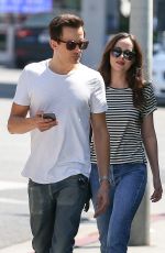 DAKOTA JOHNSON Leaves Hugo