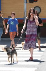 DAKOTA JOHNSON Walks Her Dog Out in Santa Monica 04/21/2017