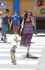DAKOTA JOHNSON Walks Her Dog Out in Santa Monica 04/21/2017