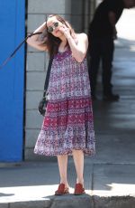 DAKOTA JOHNSON Walks Her Dog Out in Santa Monica 04/21/2017