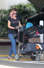 DANNII MINOGUE at LAX Airport in Los Angeles 04/04/2017