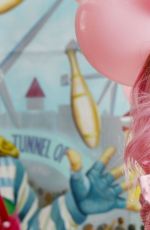 DANNII MINOGUE on the Set of a Photoshoot at Luna Park in Melbourne 04/01/2017