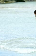 DOUTZEN KROES in Bikini Bottom on the Set of a Photoshoot at a Beach in Bal Harbour 04/24/2017