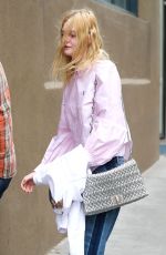 ELLE FANNING Out and About in New York 04/22/2017