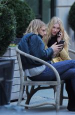 ELSA HOSK and Tom Daly on a bench in New York 04/09/2017