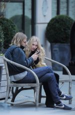 ELSA HOSK and Tom Daly on a bench in New York 04/09/2017