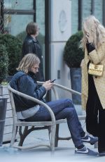 ELSA HOSK and Tom Daly on a bench in New York 04/09/2017