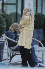 ELSA HOSK and Tom Daly on a bench in New York 04/09/2017